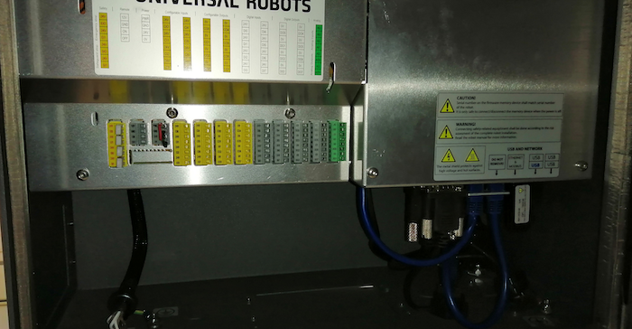 Inside the controller we learn about connectors and cables, which are exposed. The left side includes I/O and safety.