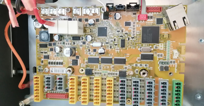 After removing the metal shields, the safety board electronics are fully visible. The main logic is driven by an NXP LPC4437JET256 MCU.