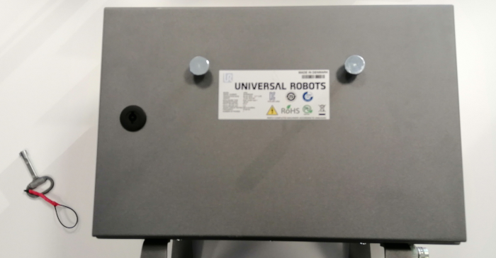 Universal Robots URe3 controller. The controller has a mechanical lock aimed to prevent ingress to the internals from non authorized parties.