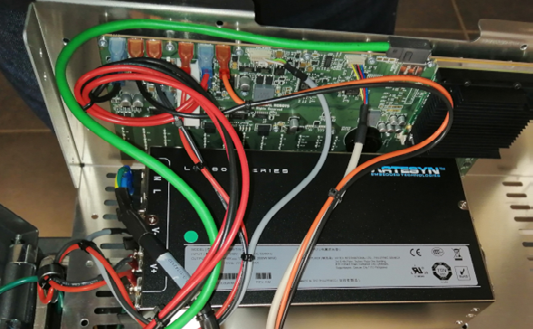 C) The main computer of the controller and the PSU are affixed to the front plate. Given the real state available we miss some cable management.